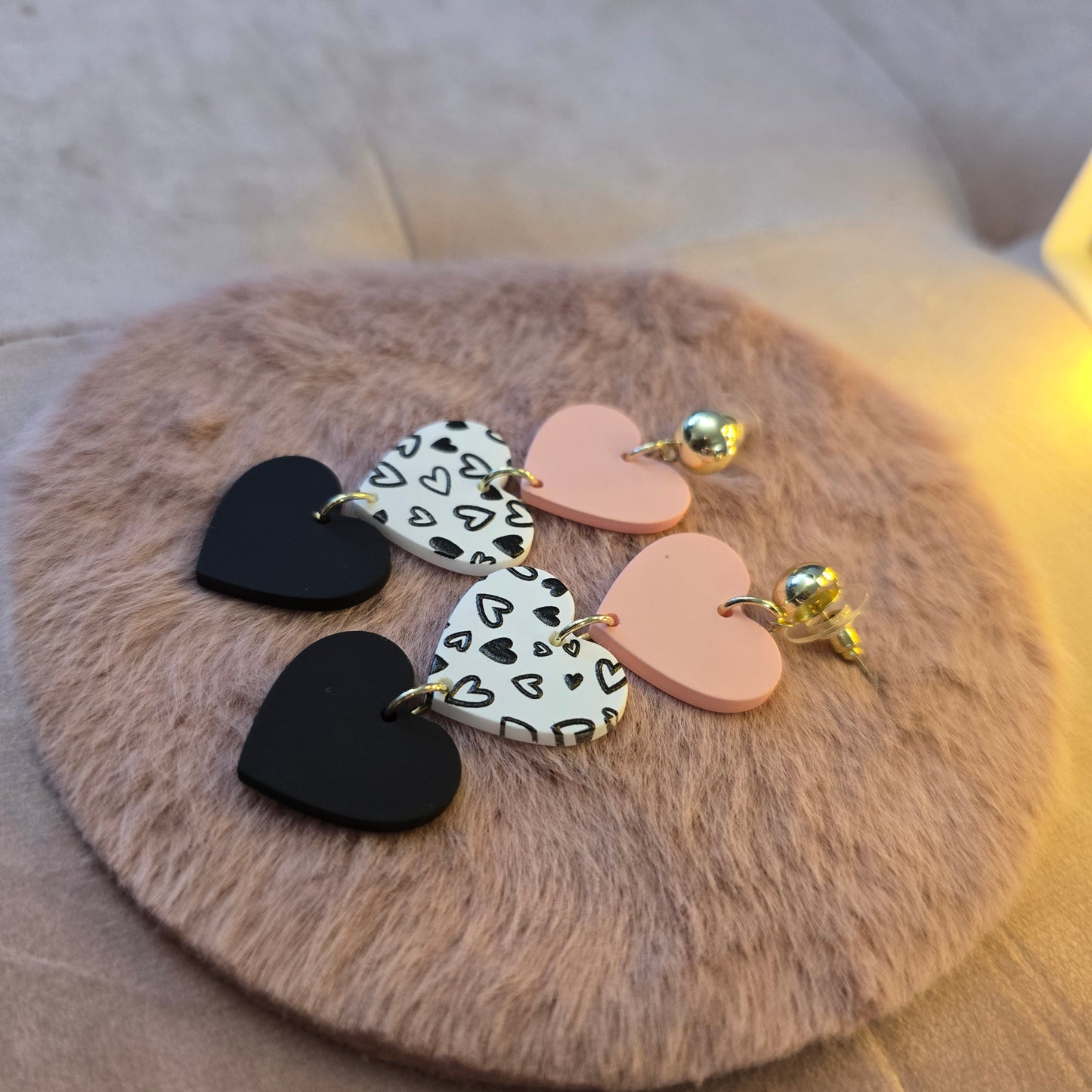 Love Me Three Times cascading Shaped heart earrings.