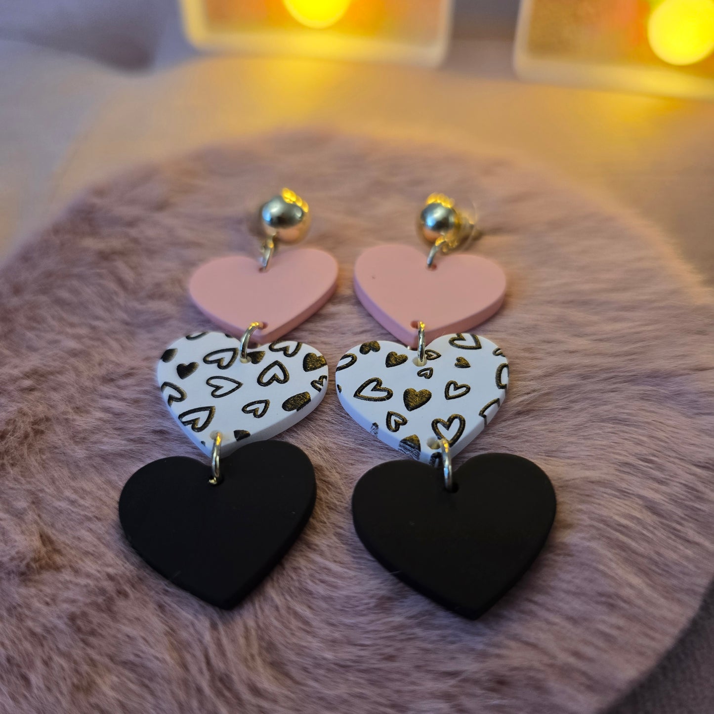 Love Me Three Times cascading Shaped heart earrings.