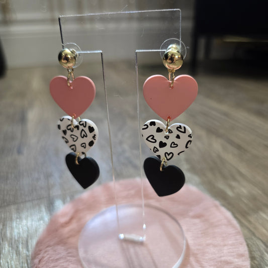 Love Me Three Times cascading Shaped heart earrings.
